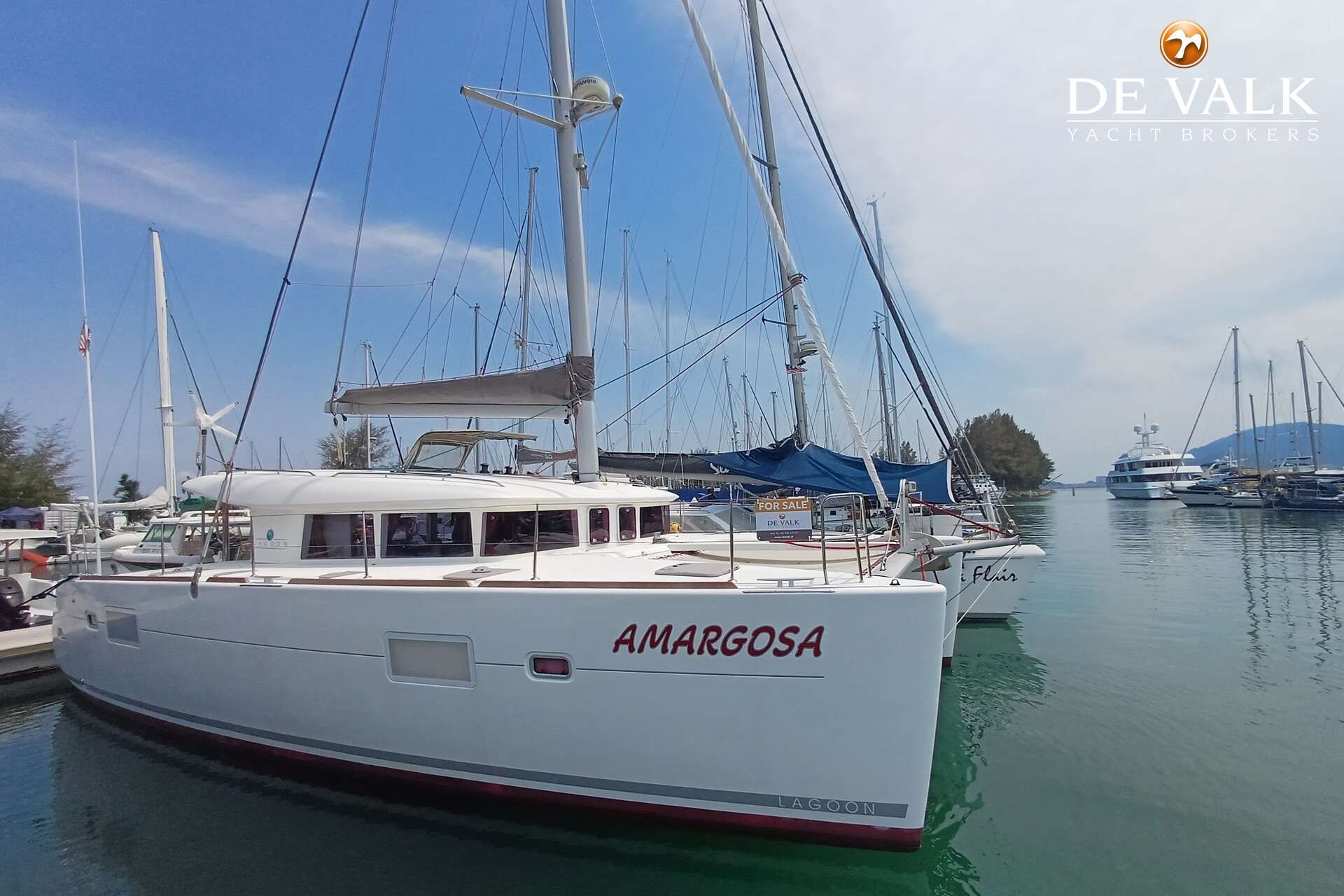 Lagoon 400 2011 Lagoon 400 catamaran "Amargosa" docked at marina, for sale by De Valk Yacht Brokers.