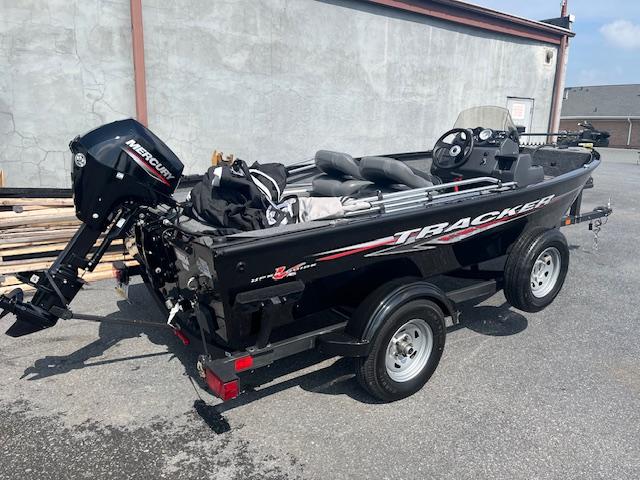Tracker Super Guide V-16 SC 2024 Tracker Super Guide V-16 SC boat with Mercury engine on trailer.