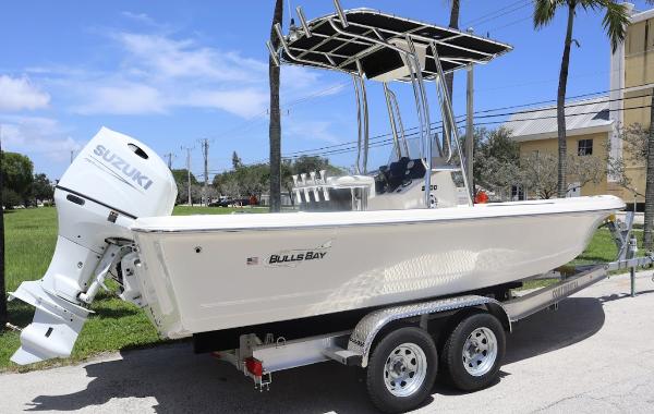 Bulls Bay 2200 2025 Bulls Bay 2200 boat on trailer with Suzuki outboard motor.