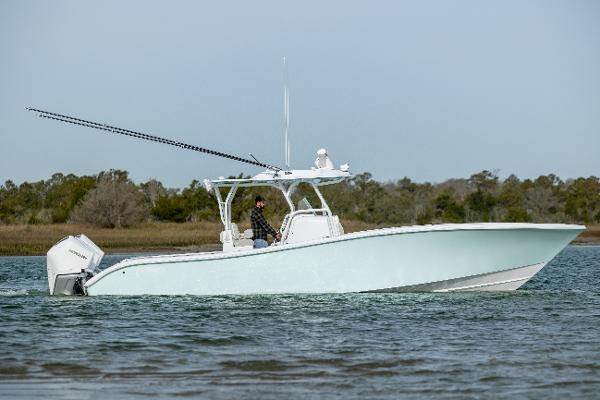 Yellowfin 34 Offshore 2024 Yellowfin 34 Offshore boat cruising on calm waters.