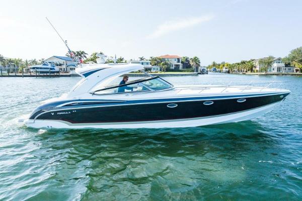Formula 400 Super Sport 2014 Formula 400 Super Sport boat cruising on a sunny day.