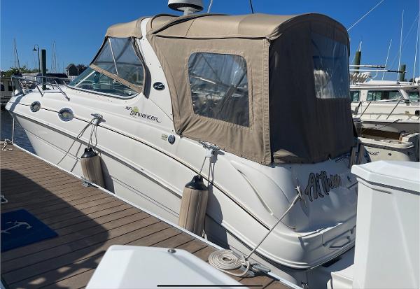 Sea Ray 280 Sundancer 2002 Sea Ray 280 Sundancer docked at a marina.