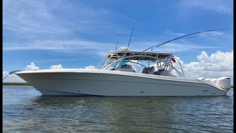 Hydra-Sports 4200 Siesta 2013 Hydra-Sports 4200 Siesta boat on calm water under blue sky.