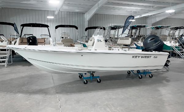 Key West 188 Bay Reef 2024 Key West 188 Bay Reef boat displayed in a showroom.