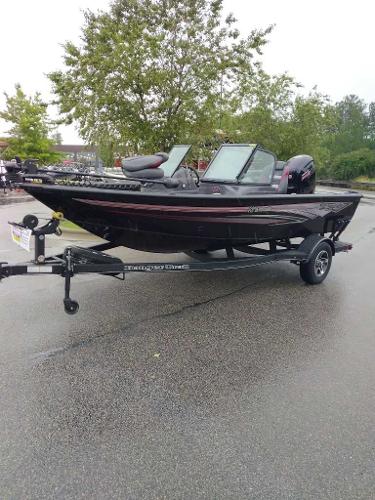 Ranger VS1682SC Angler 2024 Ranger VS1682SC Angler boat on trailer in parking lot.