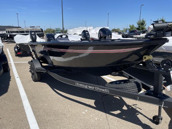 Ranger VS1665SC 2024 Ranger VS1665SC fishing boat on trailer in parking lot.