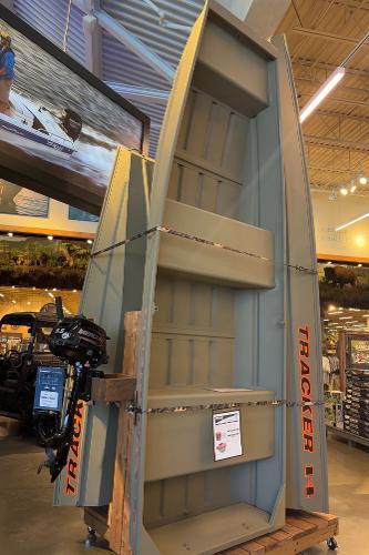 Tracker Grizzly 12 Jon 2025 Tracker Grizzly 12 Jon boat displayed vertically in a showroom.