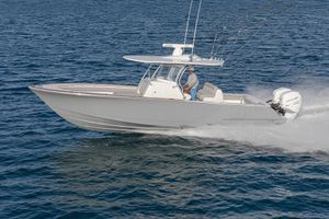 Valhalla Boatworks V-33 2026 Valhalla Boatworks V-33 cruising on open water, showcasing sleek design and powerful performance.