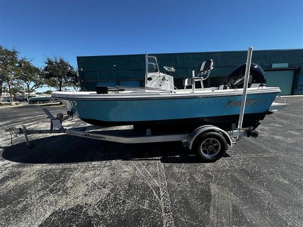 Parker 1801 Center Console 2020 Parker 1801 Center Console boat on trailer, parked outdoors.
