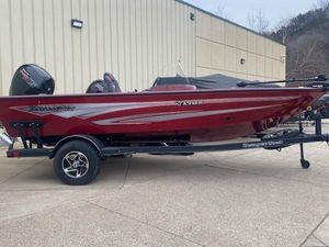 Ranger VS1782SC Angler 2024 Ranger VS1782SC Angler boat in red on a trailer, parked outdoors.