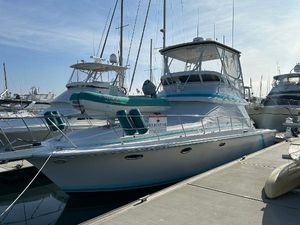 Trojan 12 Meter Convertible 1988 Trojan 12 Meter Convertible yacht docked at marina.