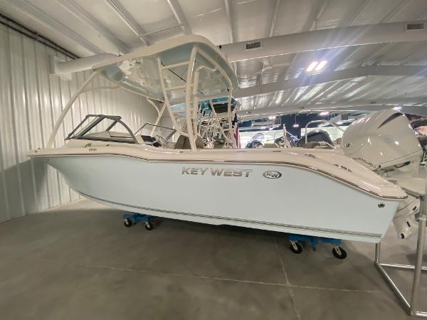 Key West 239 DFS 2024 Key West 239 DFS boat displayed in a showroom.