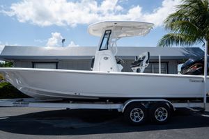 Tidewater 2410 Bay Max 2026 Tidewater 2410 Bay Max boat on trailer, parked outdoors under a sunny sky.