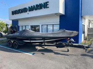 Skeeter FXR21 Apex 2022 Skeeter FXR 21 APEX boat covered, parked outside Dymond Marine.