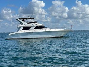Sea Ray 550 Sedan Bridge 1997 Sea Ray 550 Sedan Bridge yacht cruising on open water.