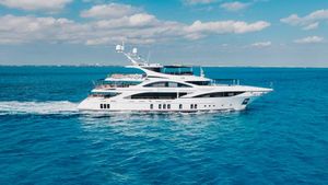 Benetti Custom Built Luxurious 2016 Benetti Custom Built yacht cruising on clear blue ocean waters.