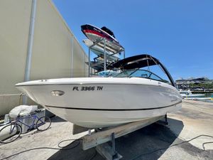 Regal LS4 2020 Regal LS4 boat on dry dock, sunny day, marina background.