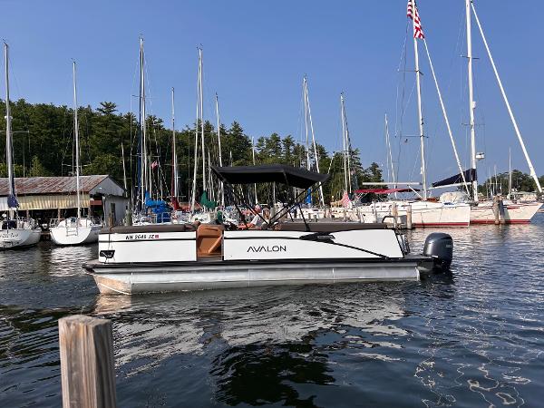 Avalon Catalina Quad Lounge - 25' 2024 Avalon Catalina Quad Lounge 25' pontoon boat docked in a marina.