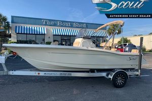 Scout 195 Sportfish 2026 Scout 195 Sportfish boat on trailer at The Boat Shed dealership.