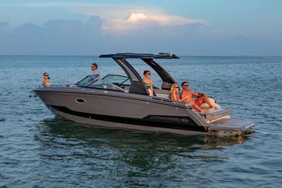 Chaparral 2870 SSX 2025 Chaparral 2870 SSX boat with people enjoying a sunset cruise on the water. Boat