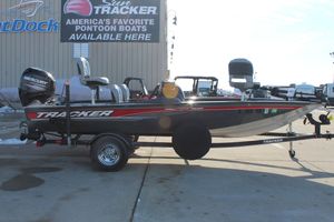 Tracker Pro Team 175 TF 2018 Tracker Pro Team 175 TF boat on trailer, displayed outdoors.