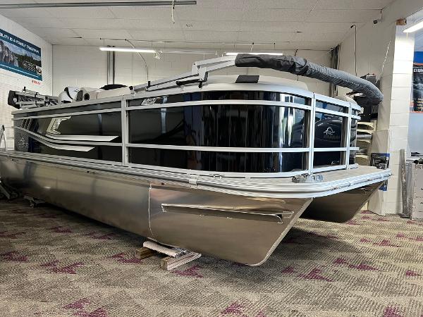 SunCatcher Select 20C 2025 SunCatcher Select 20C pontoon boat displayed indoors, showcasing sleek design and modern features.