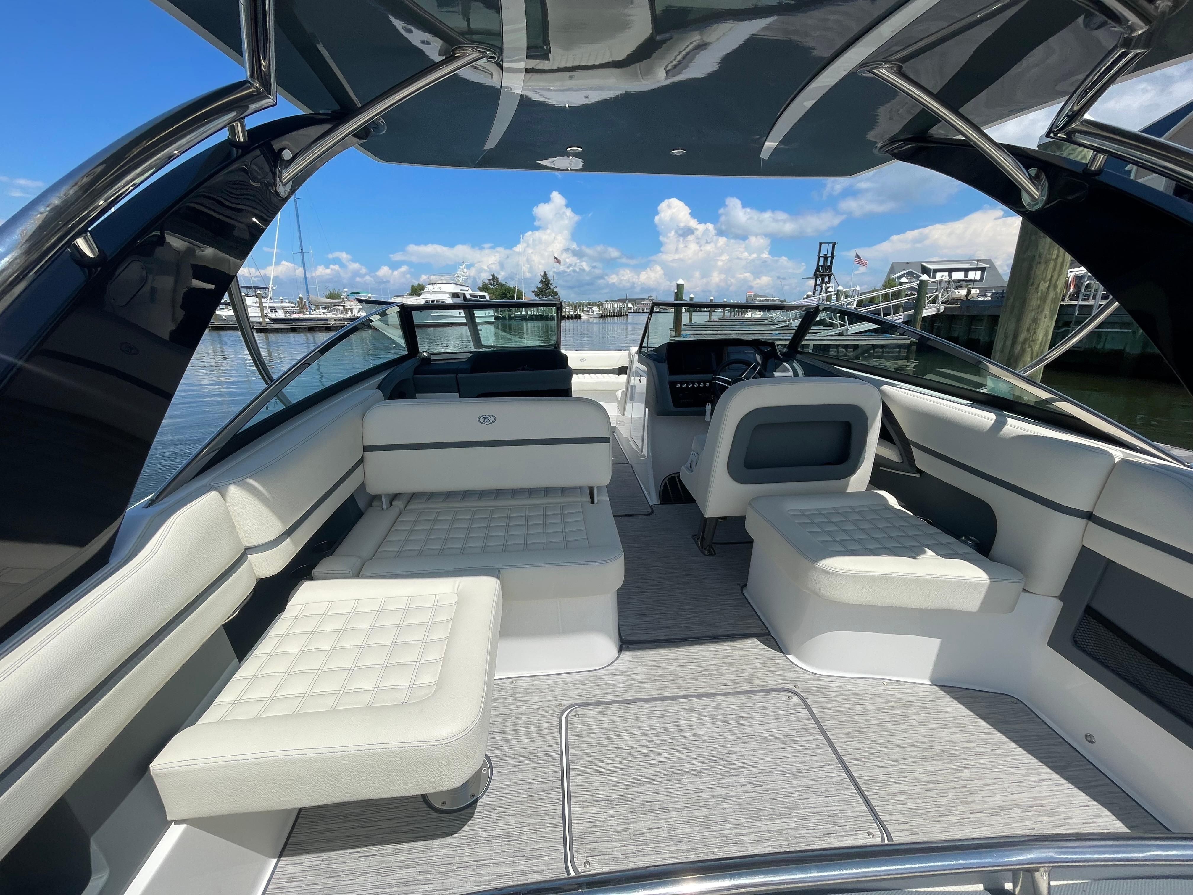 Cobalt 30SC 2022 Cobalt 30SC boat interior with luxurious seating and modern design.