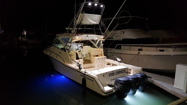 Grady-White Express 360 2007 Grady-White Express 360 boat docked at night with illuminated water.