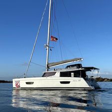 Fountaine Pajot Helia 44 Evolution 2019 Fountaine Pajot Helia 44 Evolution catamaran sailing on calm waters under clear blue sky.