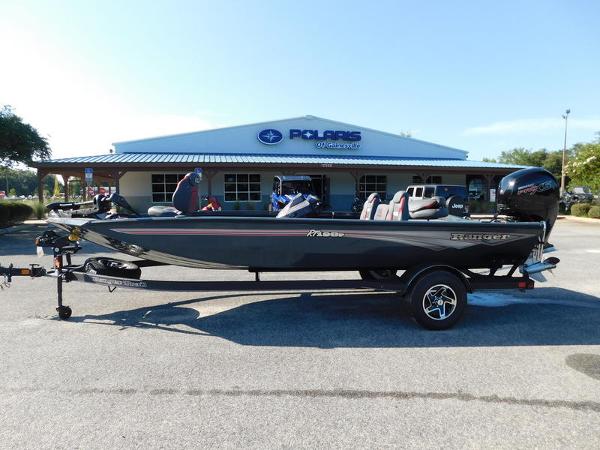 Ranger RT198P 2024 Ranger RT198P fishing boat on trailer outside Polaris dealership.