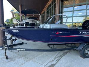 Tracker Pro Guide V-175 Combo 2019 Tracker Pro Guide V-175 Combo boat on trailer, parked outside a building.