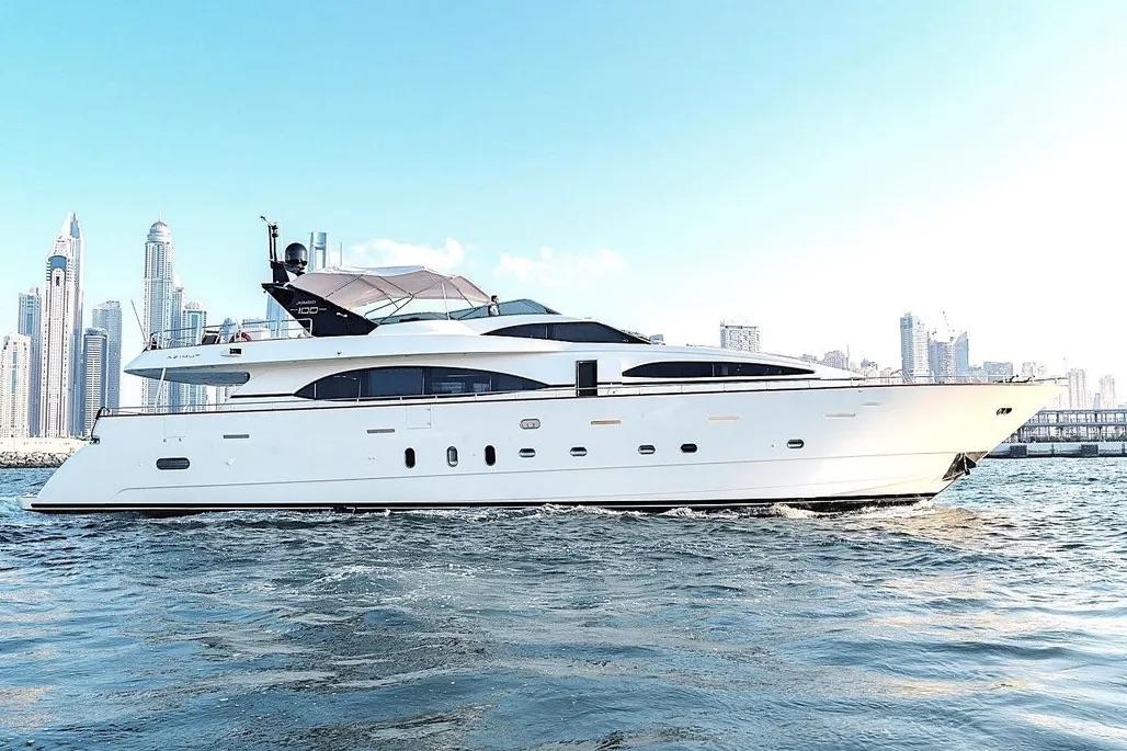Azimut 100 Jumbo 2004 Azimut 100 Jumbo yacht cruising near a city skyline.