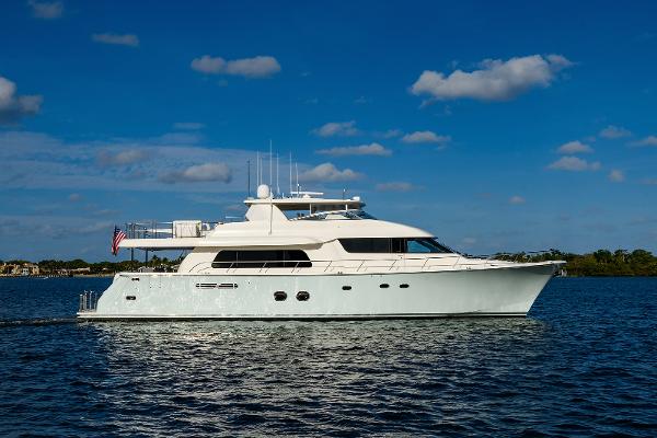 Pacific Mariner 85 2009 Pacific Mariner 85 yacht cruising on a sunny day with blue skies.