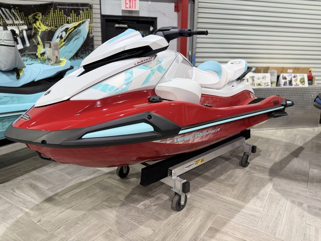 Yamaha WaveRunners VX® Limited 2025 Yamaha WaveRunners VX® Limited in showroom, red and white design on display stand.