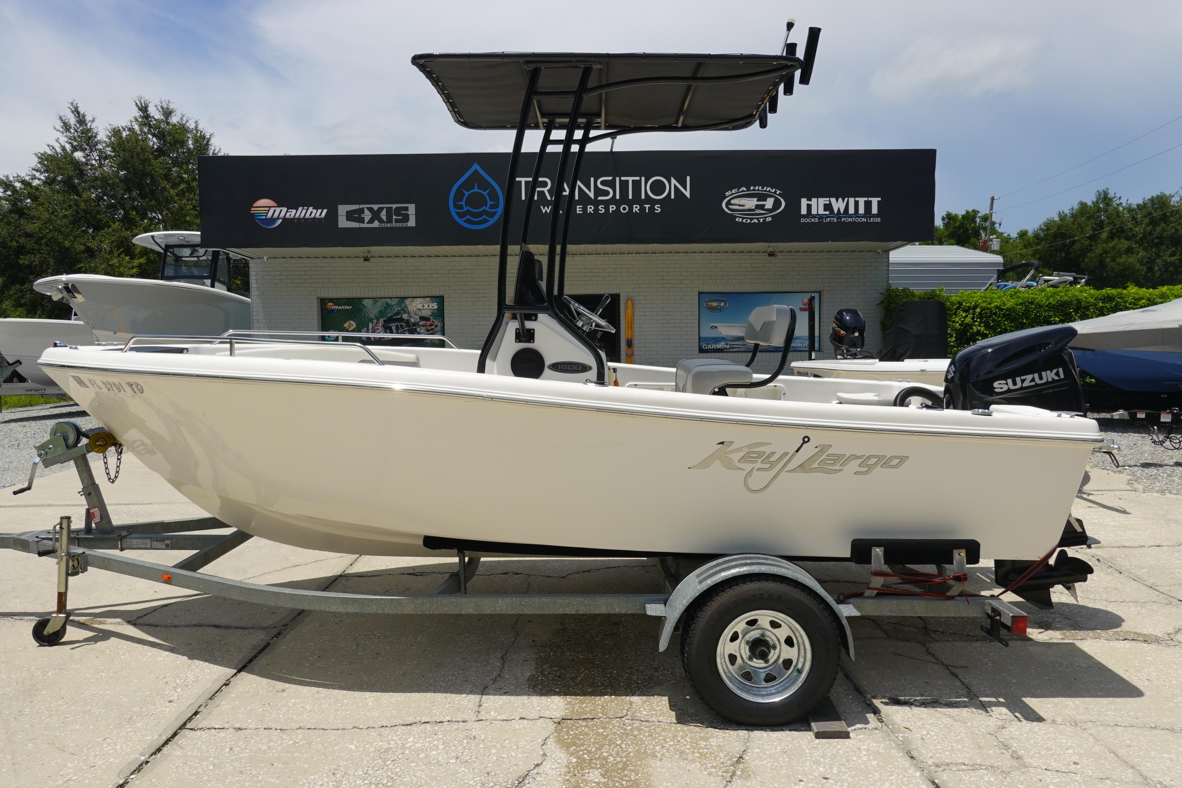 Key Largo 1800 Center Console 2022 Key Largo 1800 Center Console boat on trailer at dealership.
