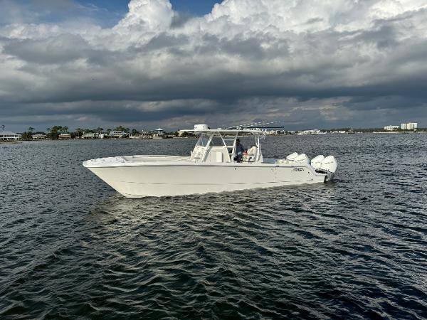 Invincible 35 Catamaran 2022 Invincible 35 Catamaran on open water under cloudy skies.
