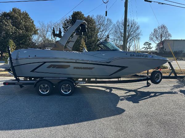 MB F22 Tomcat Alpha 2022 MB F22 Tomcat Alpha boat on trailer, parked outdoors.