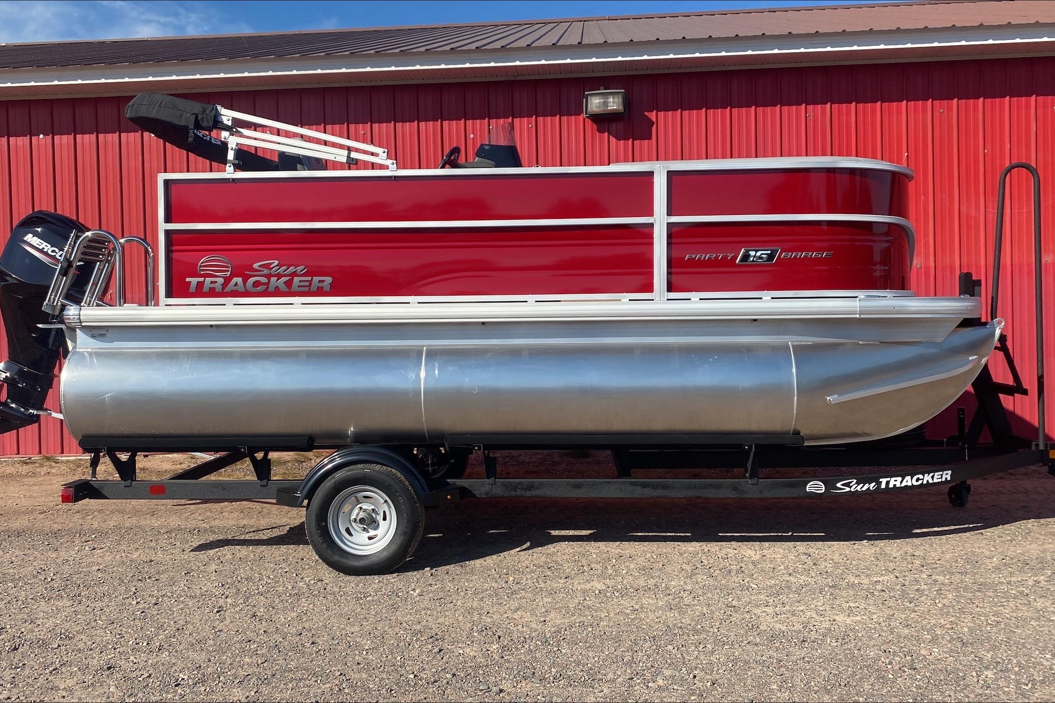 Sun Tracker Bass Buggy 16 XL Select 2026 Sun Tracker Bass Buggy 16 XL Select pontoon boat on trailer, red exterior.