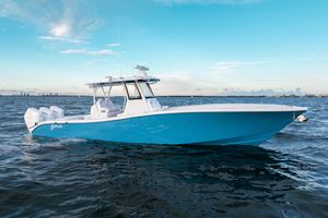 Yellowfin 36 Offshore 2026 Yellowfin 36 Offshore boat on open water under a clear blue sky.