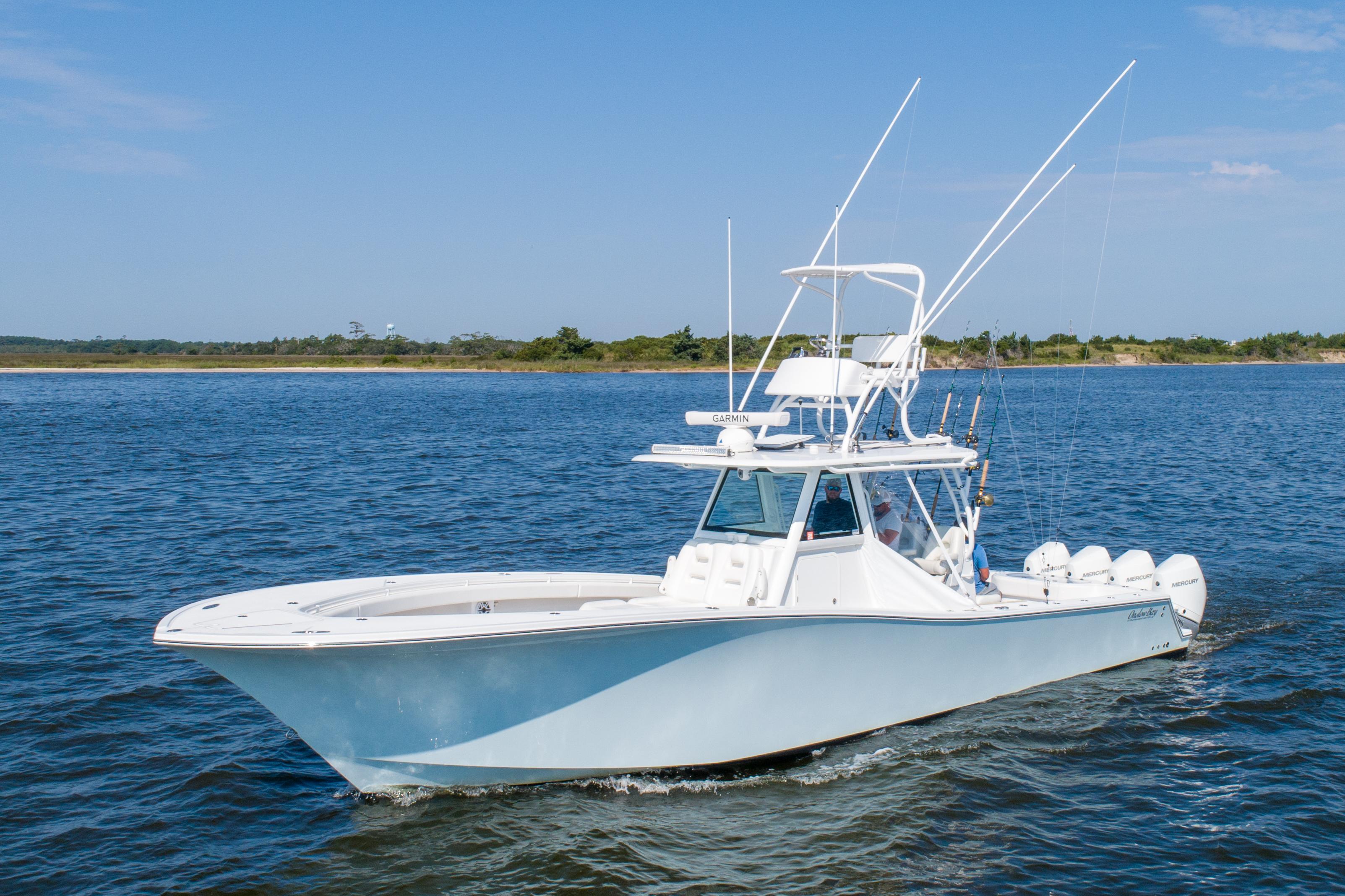 Onslow Bay 41 TE 2022 Onslow Bay 41 TE boat cruising on a calm blue sea.