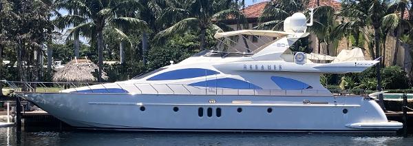 Azimut 80 Carat 2005 Azimut 80 Carat yacht docked, surrounded by palm trees and waterfront homes.