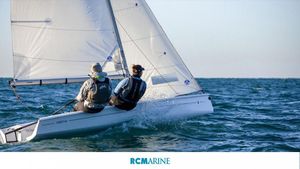 Beneteau First 14 2023 Beneteau First 14 sailboat on open water, two sailors navigating.