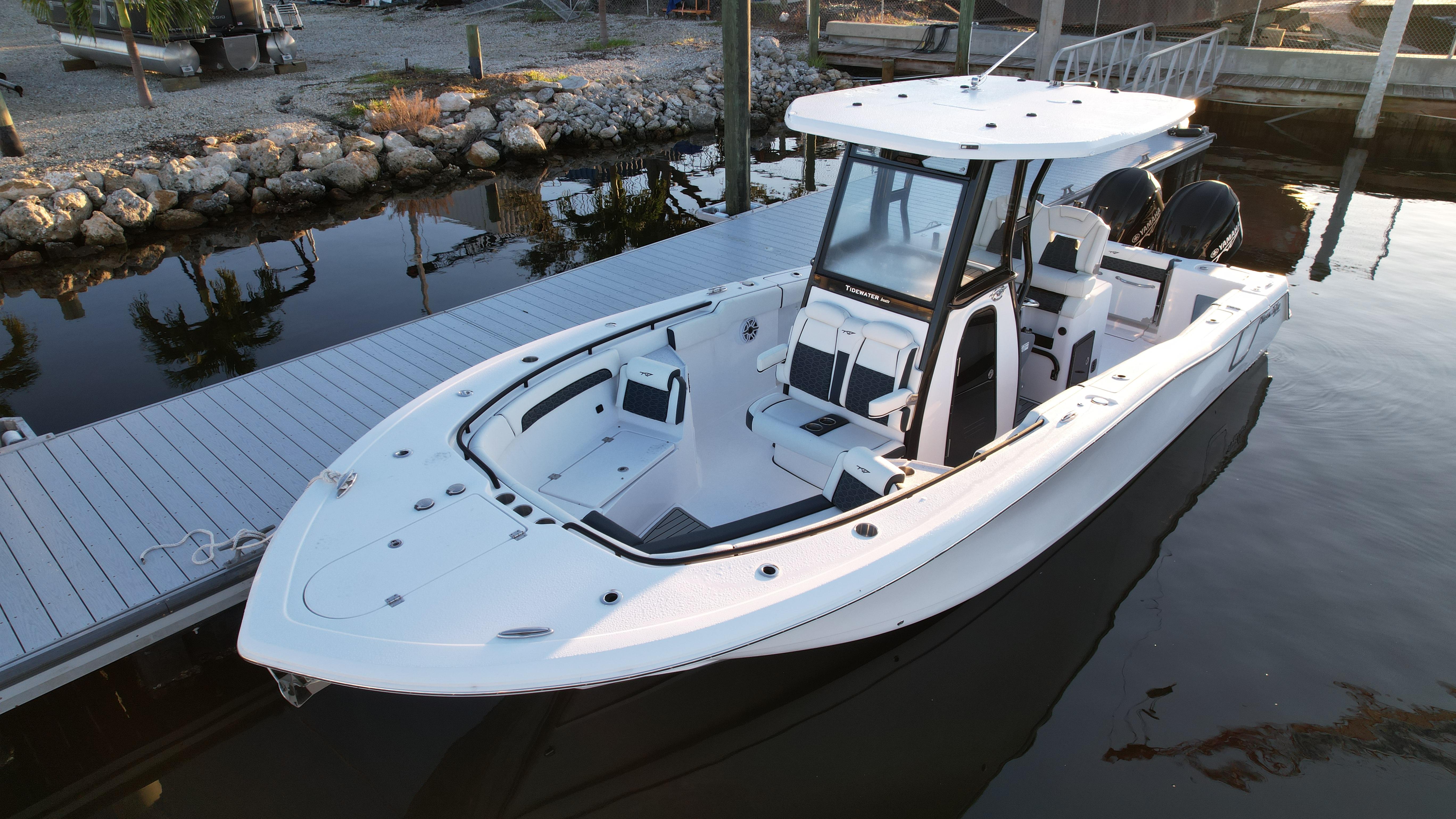 Tidewater 282 CC Adventure 2025 Tidewater 282 CC Adventure boat docked in calm waters.