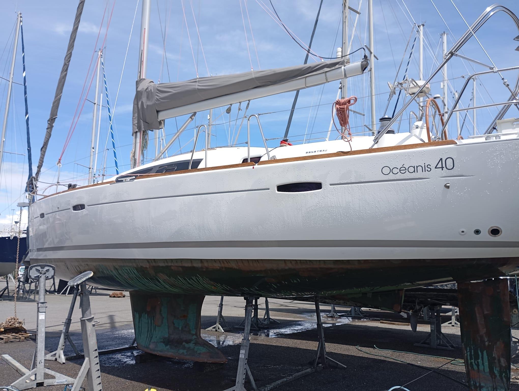 Beneteau Oceanis 40 2009 Beneteau Oceanis 40 sailboat on dry dock, showcasing sleek design and sturdy build.