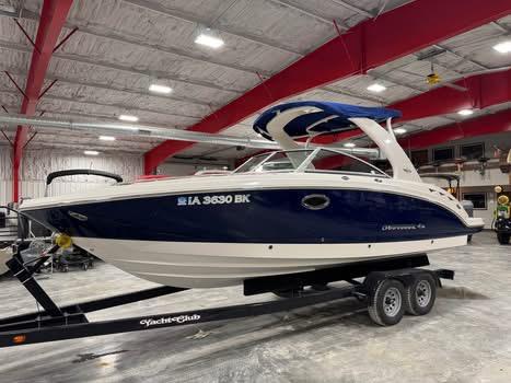 Chaparral 264 Sunesta 2011 Chaparral 264 Sunesta boat on trailer in indoor storage facility.