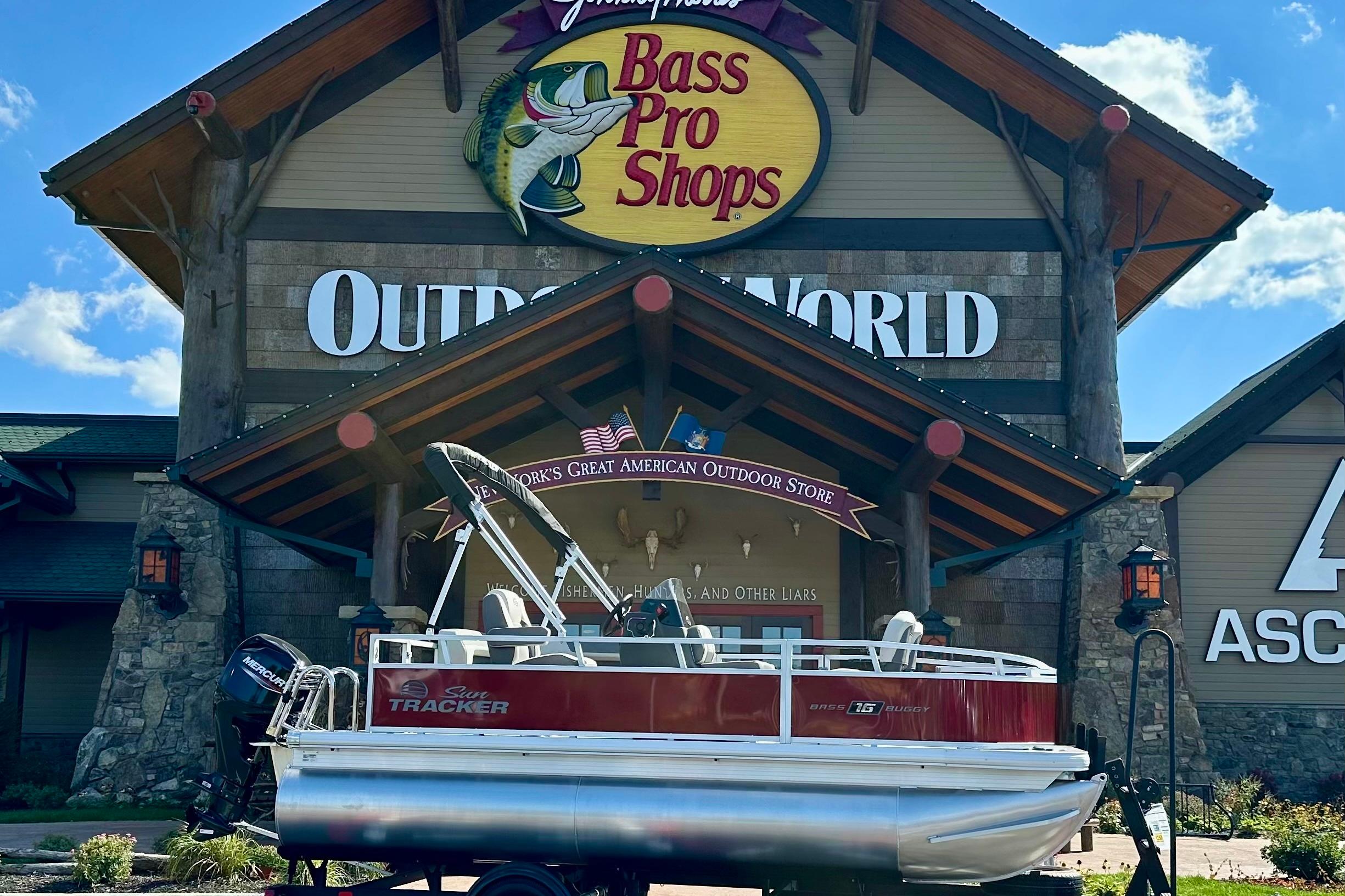 Sun Tracker Bass Buggy 16 XL Select 2026 Sun Tracker Bass Buggy 16 XL Select pontoon boat displayed at Bass Pro Shops.
