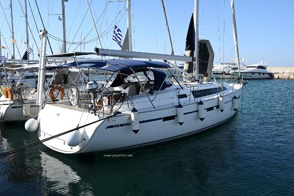 Bavaria Cruiser 46 2019 Bavaria Cruiser 46 yacht docked in a marina, featuring sleek design and spacious deck.