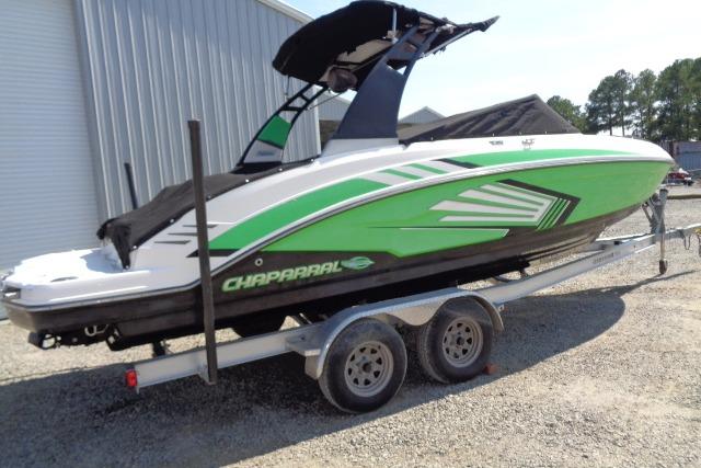 Chaparral Vortex 243 VRX 2018 Chaparral Vortex 243 VRX boat with green and white design on a trailer.