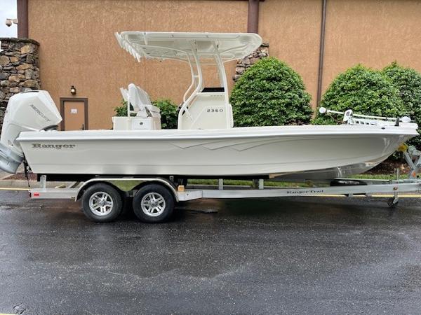 Ranger 2360 Bay 2025 Ranger 2360 Bay boat on trailer, parked outdoors.