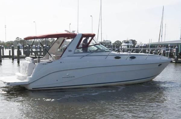 Rinker 342 Express Cruiser 2006 Rinker 342 Express Cruiser boat docked in a marina.